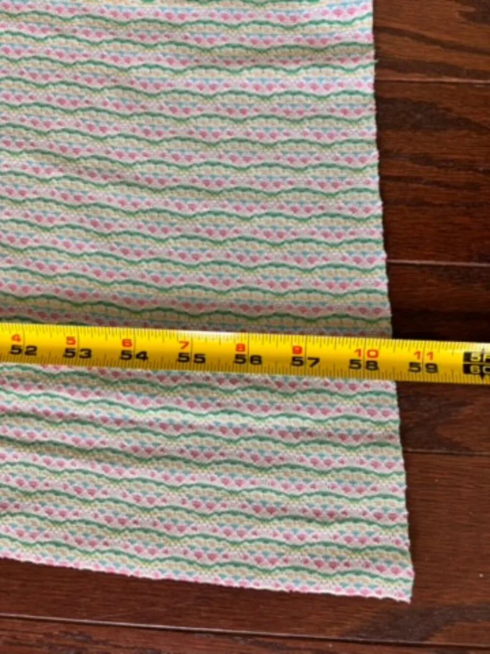 Multicolor wavy striped knit fabric with repeating pattern of pastel lines